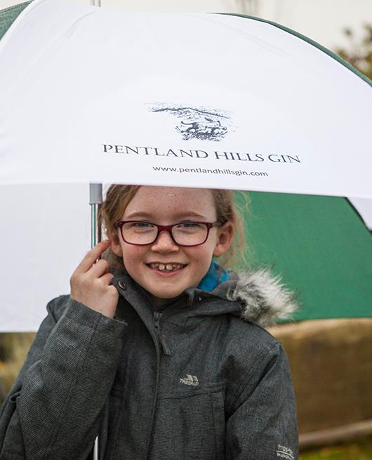 Child With Branded Umbrella - Pentland Hills Gin